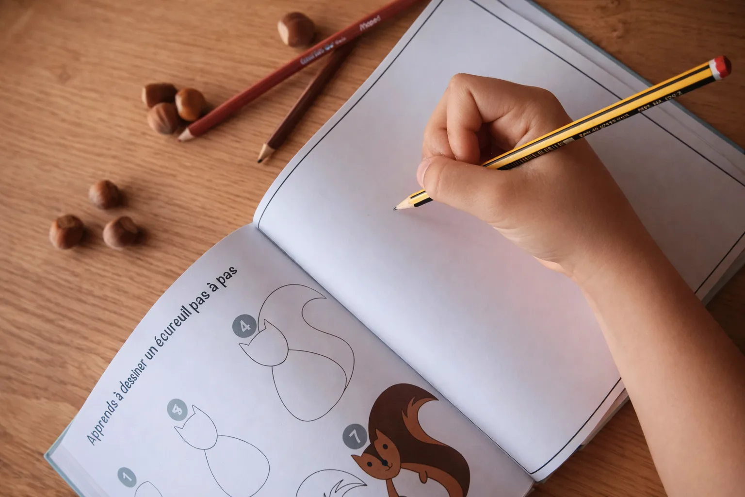 Un enfant qui dessine, inspiré par les Contes de Zoufftgen